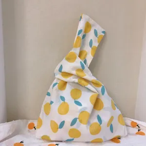 Japanese minimalist fabric tote bag with cute yellow lemon print casual wrist handbag for women.