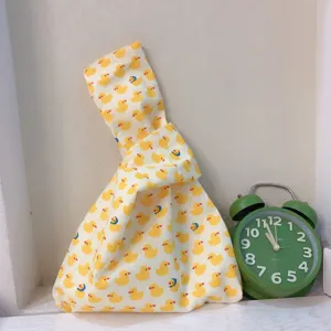 Japanischer Knoten Handgelenk Tasche niedliche gelbe Ente Muster Stoff Handtasche Freizeit Tasche