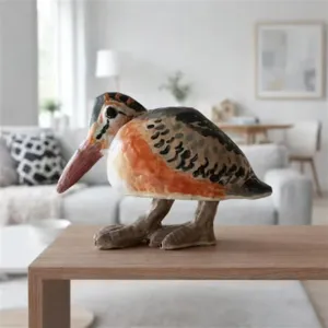 Resin woodcock bird figurine detail, artistic texture, realistic finish, table decor closeup.