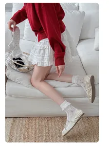 Cute Japanese polka dot lace ruffle socks for women breathable mesh short socks summer wear.
