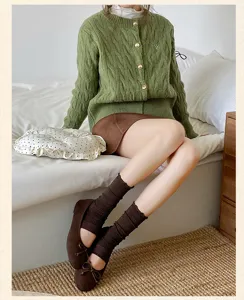 Detailed view of stylish stirrup socks paired with cute shoes, comfortable daily wear.