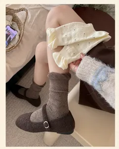 Cute Japanese polka dot mid-calf socks for women, sweet bubble cuff design, cozy autumn hosiery detail.