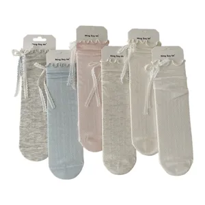 Chaussettes mi-hautes respirantes en maille filet pour femmes ruban dentelle nœud