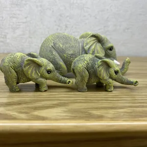 Cute miniature elephant figurine set, realistic animal sculpture ornament for home desk decor.