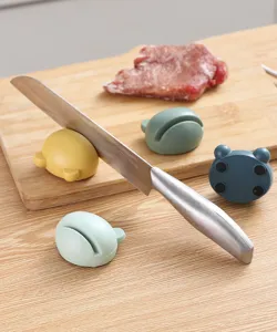 Mini cute animal knife sharpener detail, kitchen gadget scene display, non-slip design.