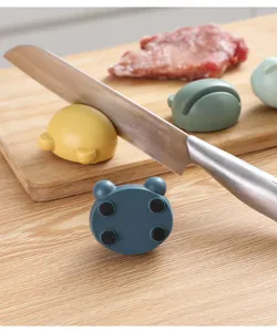 Compact cartoon animal knife sharpener detail, featuring non-slip base for quick kitchen use.