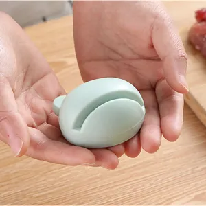 Portable cartoon frog knife sharpener for home kitchen, multi-functional quick sharpener.