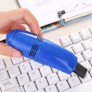 Mini USB vacuum cleaner for keyboard, portable handheld desktop cleaning tool for computer.