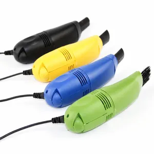 Mini USB handheld vacuum cleaner for computer keyboard and desktop dust cleaning tool variant.