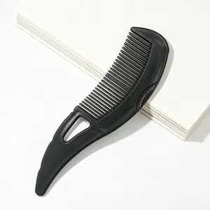 Minimalist black plastic hair scalp massage comb for daily home use clean and durable design main image