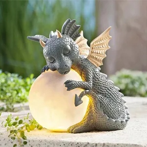Cute resin sleeping dragon LED light statue, perfect garden and home decorative ornament.