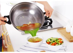 Silicone soup pouring spout kitchen anti-spill guide tool for pot edge liquid transfer.