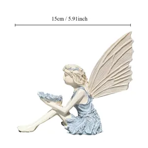 Resin fairy figurine detail view, angel garden decor ornament with bird feeder tray, 15cm.