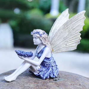 Detailed view of resin fairy angel figurine bird feeder, perfect for garden and home decor.
