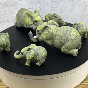 Cute elephant family figurines set miniature animal statues for home decor garden landscape.