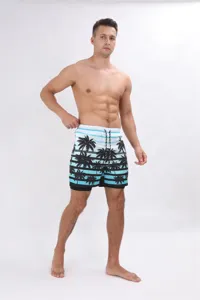 Vista dettagliata pantaloncini da bagno uomo motivo palme tropicali con cordoncino rapido.