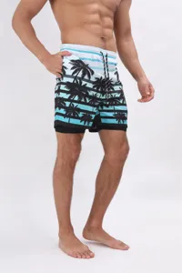 Dettaglio pantaloncini mare uomo con stampa palme, doppio strato asciugatura rapida, vita elastica.
