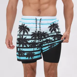 Dettaglio pantaloncini da bagno uomo, costume mare asciugatura rapida con stampa palma e coulisse.