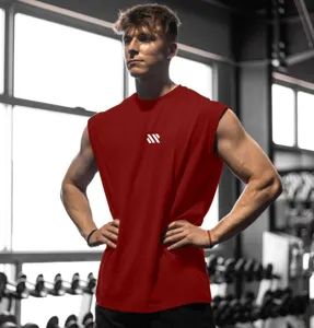 Débardeur de fitness sans manches rouge homme, respirant coupe ample sport vue détaillée.