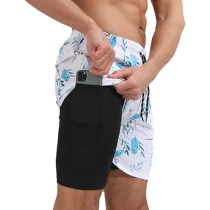 Short de bain 2 en 1 pour homme avec doublure de compression et poche téléphone plage.