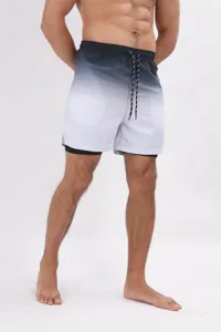 Primo piano di pantaloncini da bagno uomo a doppio strato con dettagli in vita.