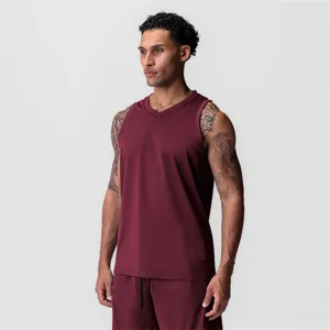 Breathable mesh athletic tank top and shorts set in maroon, ideal for summer running workouts.