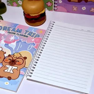 A5 spiral notebook with cute capybara cartoon cover and lined pages for student study.