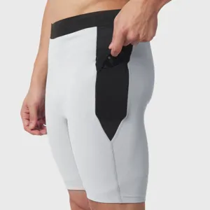 Short de compression de sport pour homme avec une poche latérale pour course et fitness.