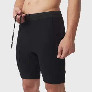 Shorts de sport pour homme avec poches, short de compression fitness respirant et séchage rapide.
