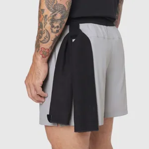 Detail view of grey athletic shorts with towel loop, quick-dry fabric for men's sportswear.
