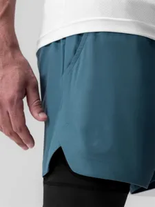 Short de sport 2 en 1 pour homme avec doublure de compression pour course et fitness.