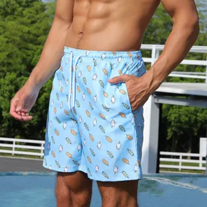 Detailed view of men's blue ice cream printed beach shorts featuring a comfortable drawstring waist.
