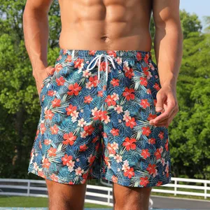 Men's tropical floral print quick-dry beach shorts with elastic drawstring and pockets.