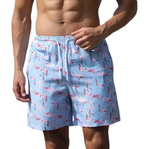 Men's light blue flamingo printed quick-dry board shorts, casual summer beach swimwear.