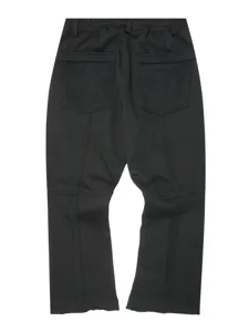 Men's black high street casual trousers with paneling details, loose fit for autumn wear.