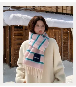 Korean style wool blend scarf detail, cozy pink and blue stripes with soft fringe trim.