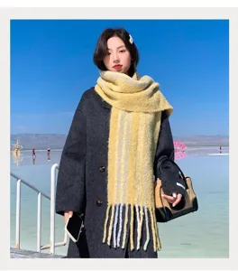Korean style winter warm yellow scarf for women, thick tassel knitted neck warmer accessory.