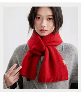 Cozy red knit winter scarf for women, soft warm neck warmer for cold weather commuting.