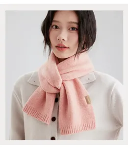 Cozy pink knitted winter scarf for women, soft and warm neck warmer for daily commute.