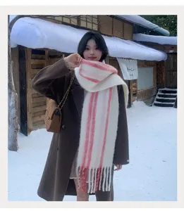 Women fluffy winter scarf with pink and white stripes, cozy neck warmer for cold days.