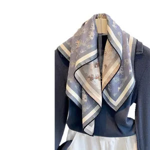 Luxurious silk wool square scarf featuring elegant horse carriage pattern. Perfect autumn accessory.