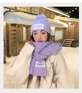 Winter purple knit hat and scarf set with lace patch, warm cozy stylish cold weather wear.