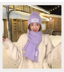 Winter warm knitted purple hat and scarf set with white lace patch for women daily wear.