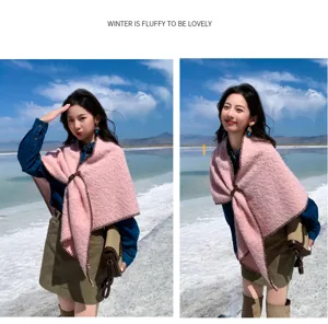 Cozy pink fluffy winter shawl detail, thick warm ethnic style cape cloak outdoor scene