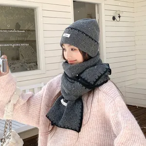 Korean style winter warm knitted hat and scarf two-piece set for women, cozy and chic.