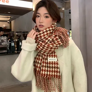 Classic red and white houndstooth winter scarf with fringe for women, stylish and warm.