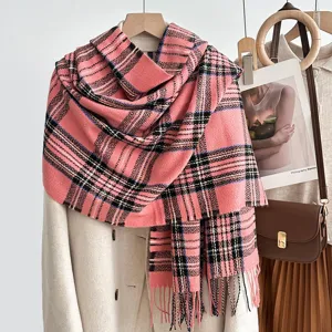 Detail view of the pink classic plaid winter scarf, soft cashmere-feel tassel design for women.