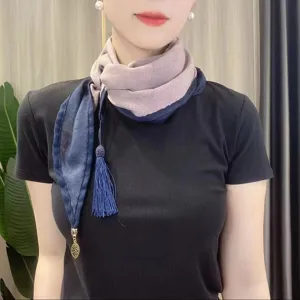 Women dual-color scarf with tassel and leaf pendant, stylish neck wrap accessory for daily wear.