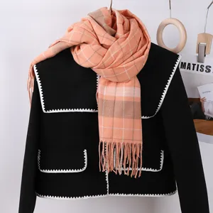 Orange plaid cashmere-feel winter scarf with tassels, warm and stylish neck wrap for women daily.