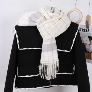 Classic plaid cashmere-feel winter scarf with elegant fringe, warm and stylish for cold weather.